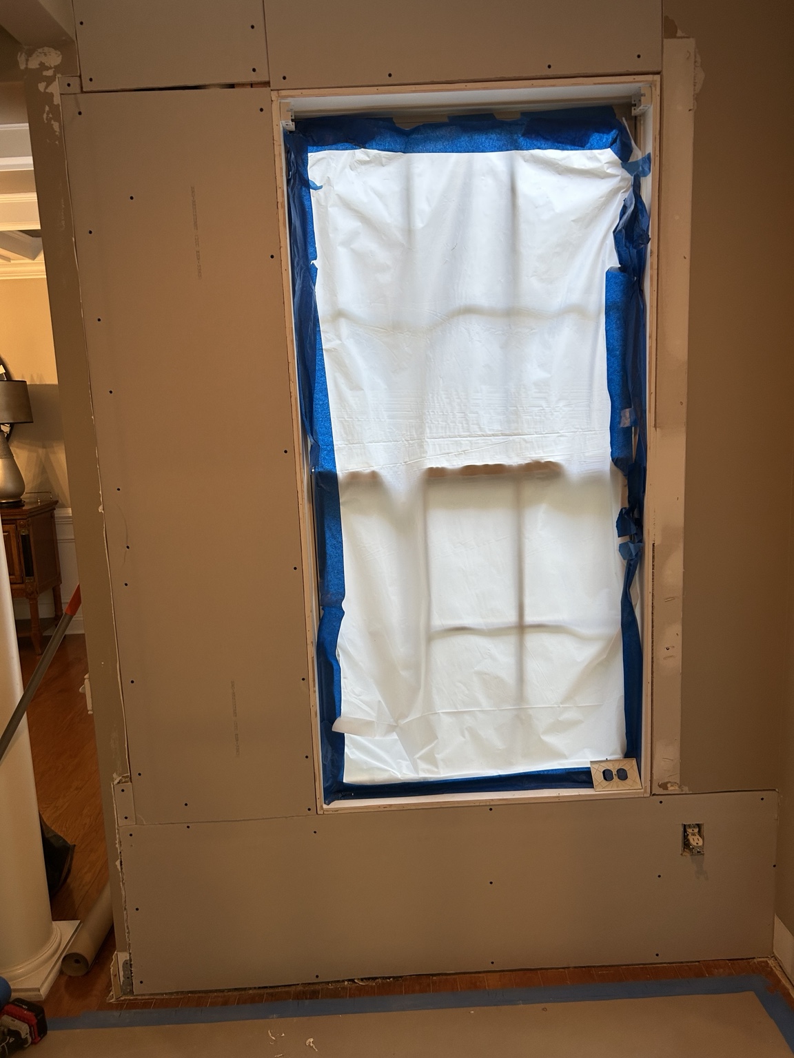 Opened wall around the window before drywall and trim finishing.